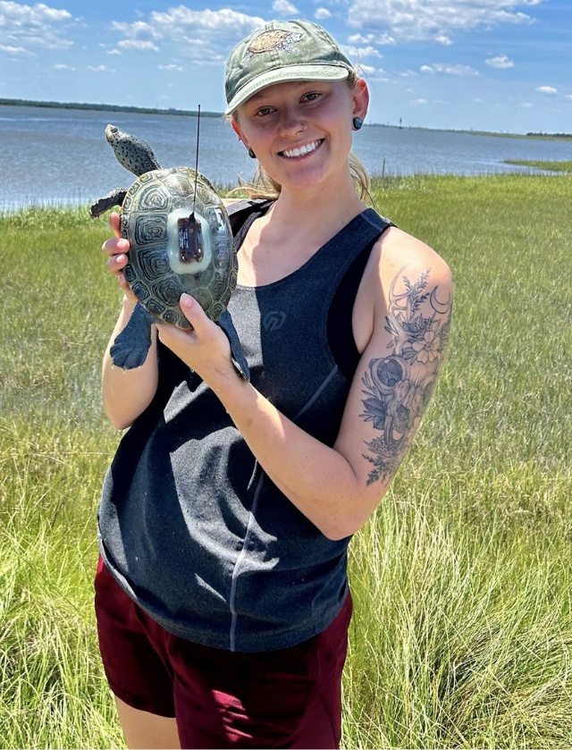 Coastal Georgia alumna Abbey Crossman with turtle