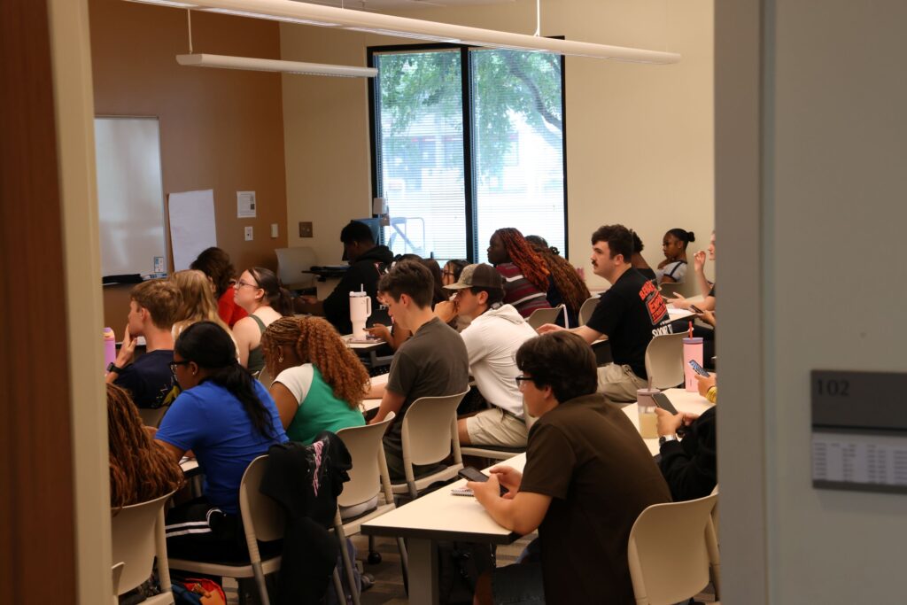 Students sitting in class one the first day of the fall semester.